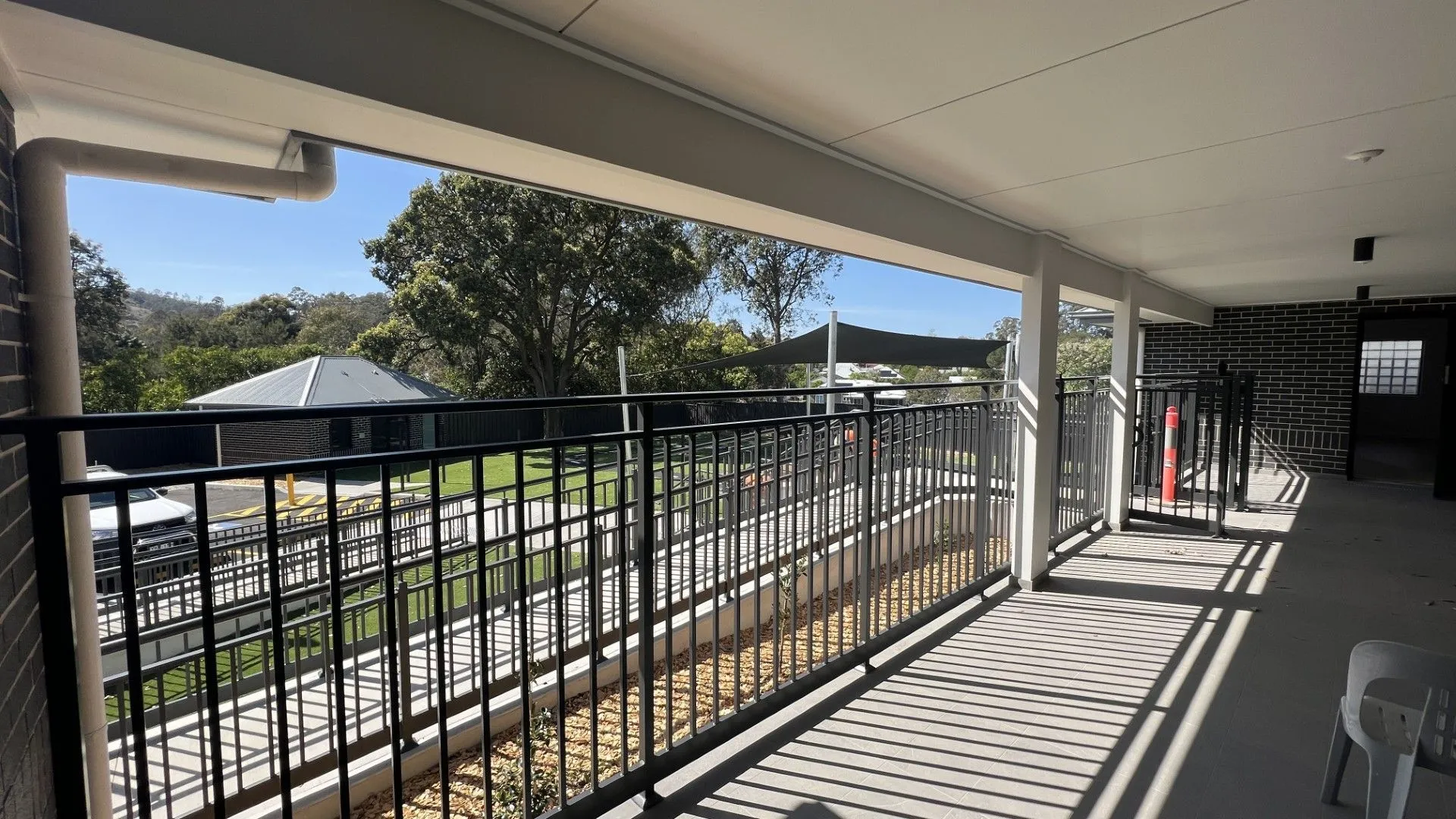 Covered first floor verandah with safety balustrade at a childcare centre fitout