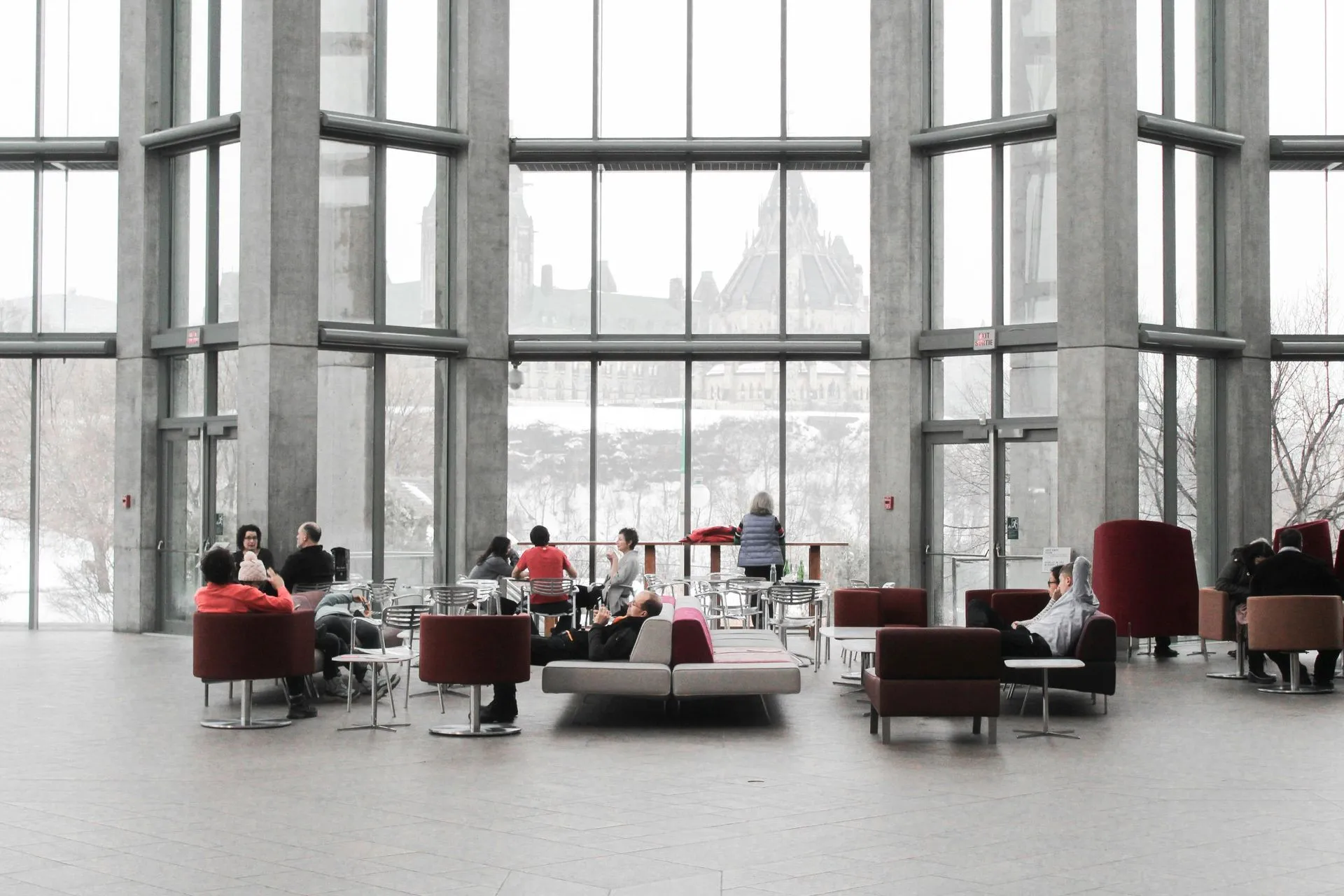 Double height commercial atrium with breakout lounge seating