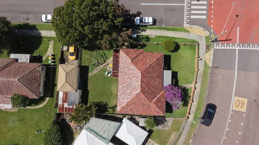 Aerial view of the Wyong home on its corner block before renovation